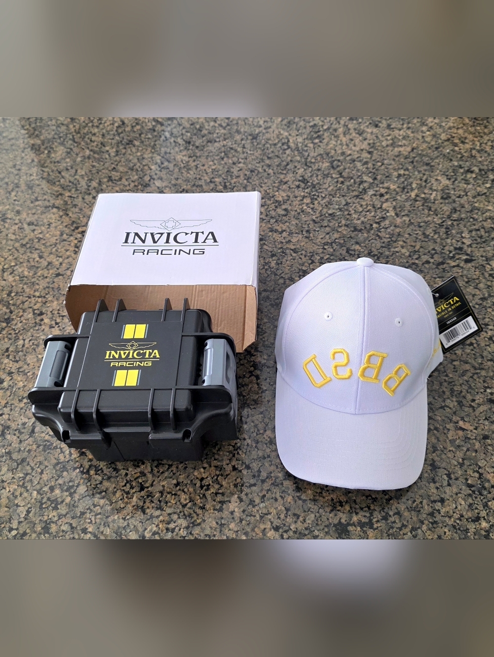 Invicta Racing branded watch case in black with yellow decals and BBSD exclusive